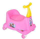 Pink plastic toddler potty training seat with a yellow handle and four wheels, decorated with cartoon character stickers.