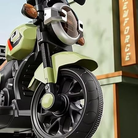 Close-up of a toy motorcycle with a green seat and black wheels, set against a blurred background.