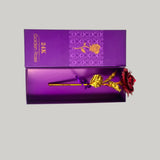 Gold-colored rose with red petal inside a purple box labeled 'Golden Rose'.