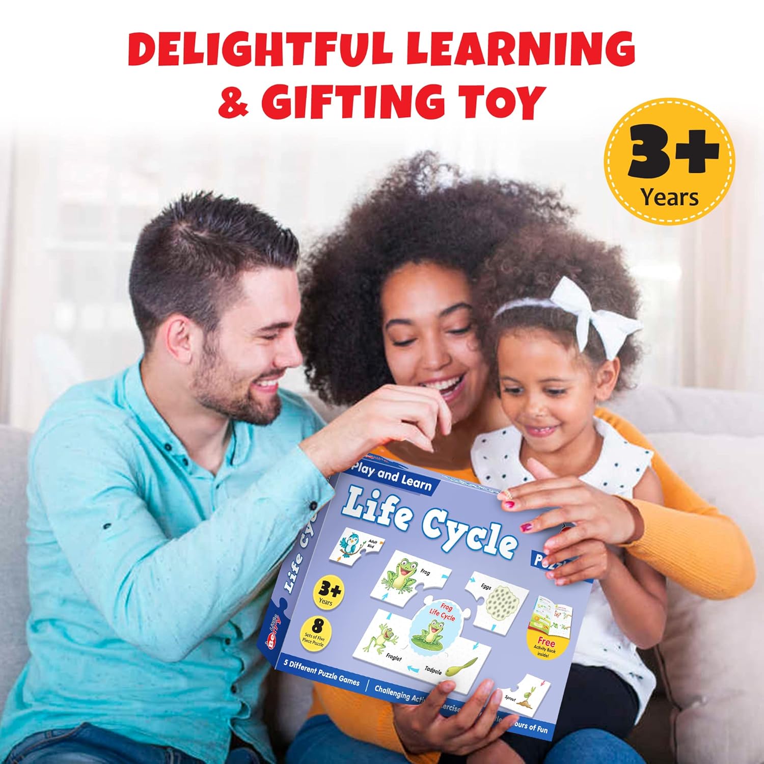 Family interacting with a educational toy titled 'Life Cycle' on a couch.