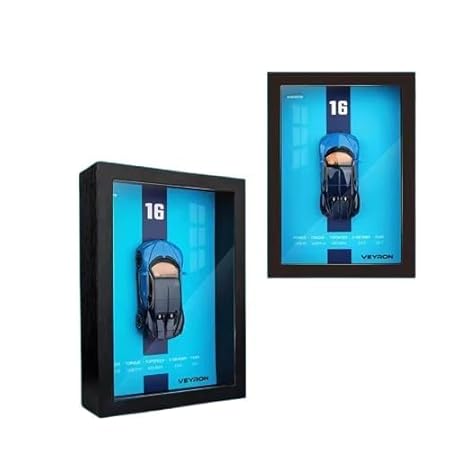Two black display cases with blue screens showing a car model labeled '16' and 'Veyron'.