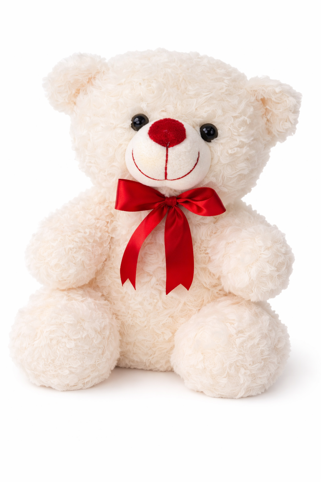 White teddy bear with a red bow on a white background