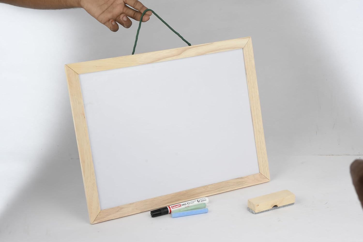 Wooden frame with whiteboard on a plain background