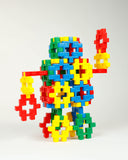 Colorful toy figure made of interlocking bricks 