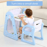 Child sitting at a small table with a chair that can be turned into a desk, in a living room setting.