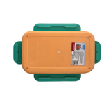 Yellow food storage container with green lids on a white background